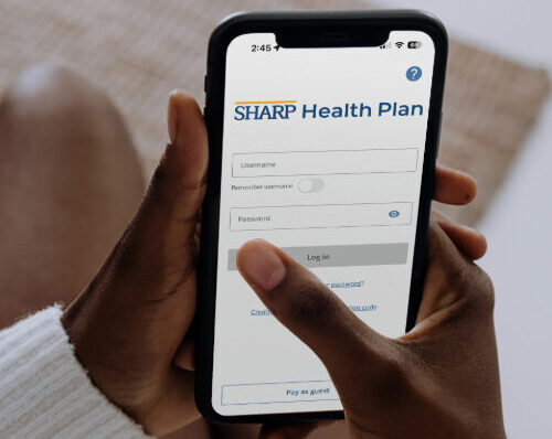 user opening sharp health plan mobile app