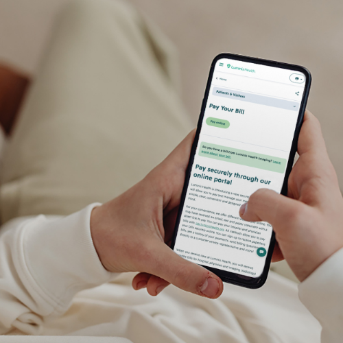 A girl using her phone to view her provider’s website