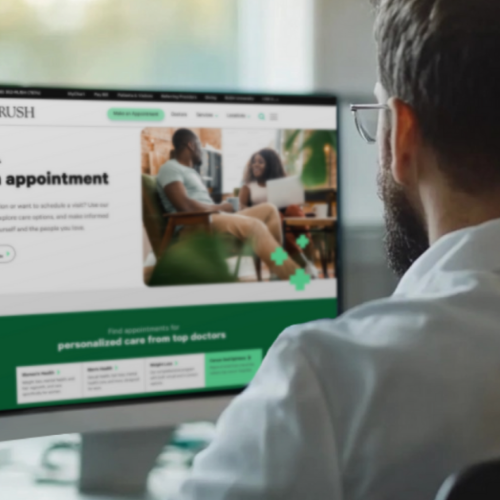 man looking at Rush health's website